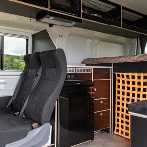 Mighty DeLite Campervan – 4 Berth NZ Interior Front Seats Dinette Mighty DeLite Campervan – 4 Berth NZ Interior Front Seats Dinette