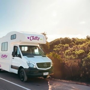 Jucy Chilld Big Kahuna 6 Berth NZ Coastal Road Front Side View Jucy Chilld Big Kahuna 6 Berth NZ Coastal Road Front Side View