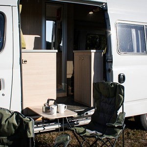 EC Motorhome – 2+1 Berth NZ Exterior Entry Door Table Chairs